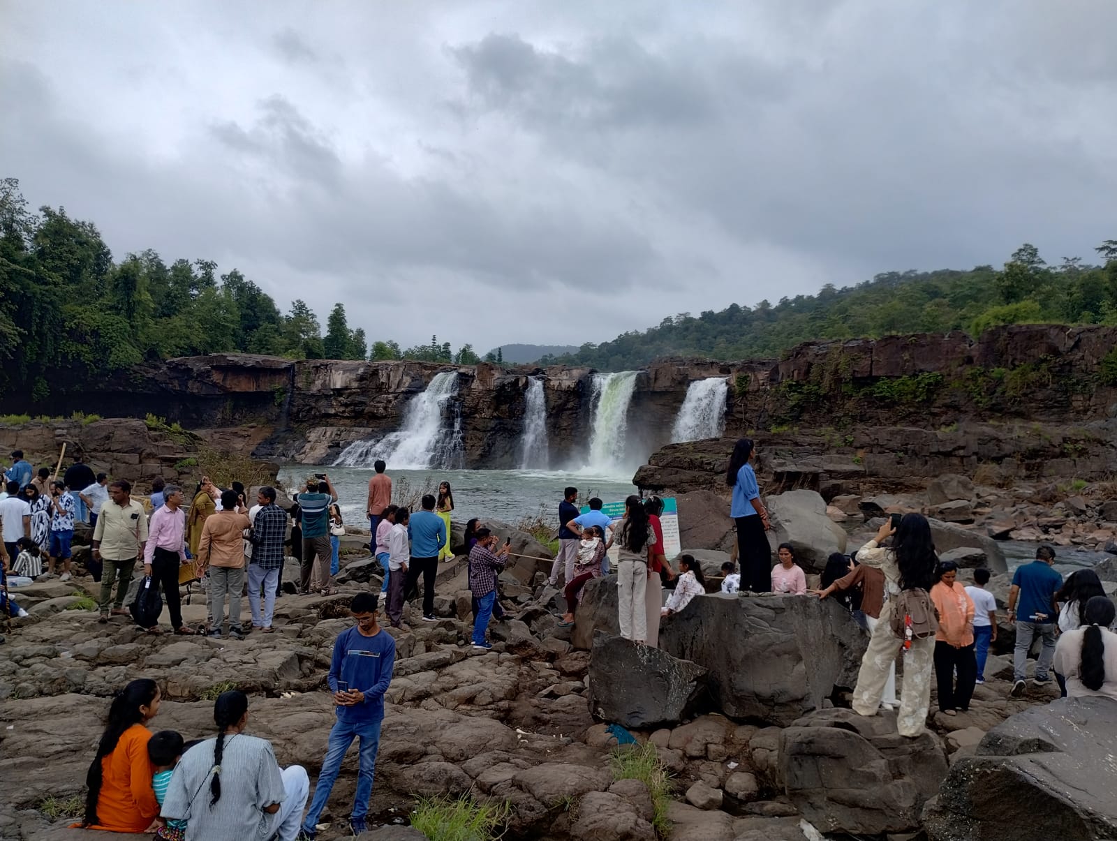 Gira Waterfall in full monsoon flow, and half of Gujarat there to see it.